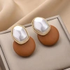 Trendy retro fashion Hong Kong-style leather earrings, 2022 new trendy and niche design sense ear stud earrings for women R029 details Picture
